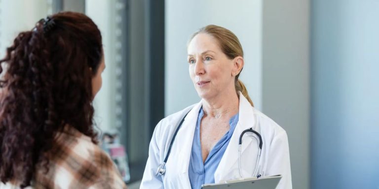 Woman consulting with a hormone replacement therapy specialist after a hysterectomy to discuss symptom relief and personalized treatment options | Hormone Replacement Therapy After a Hysterectomy